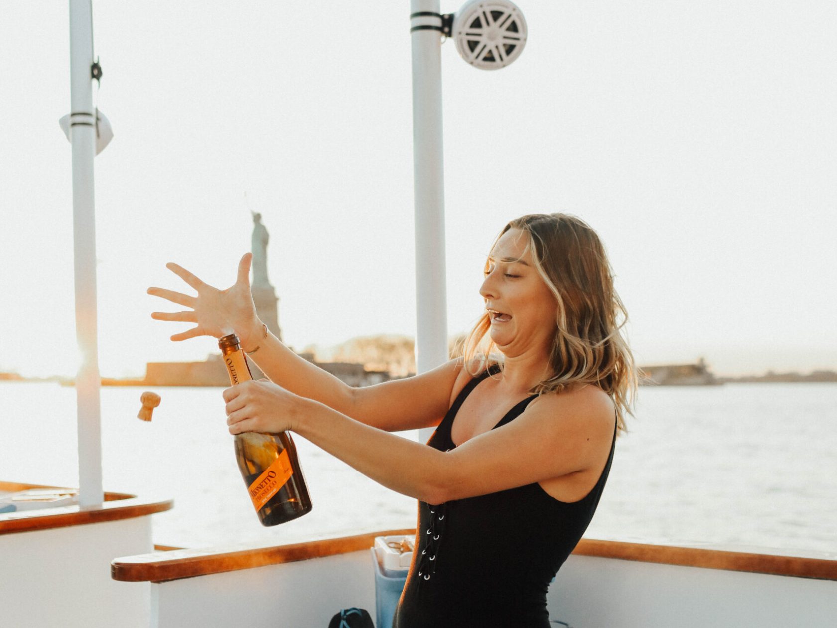 woman toasting on a hot tub boat in DC