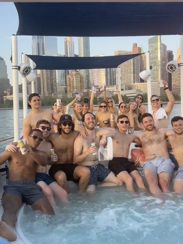 a group of people in a the DC hot tub boat