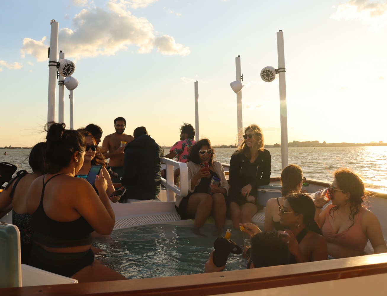 Group of people in DC on hot tub boat tour of monuments