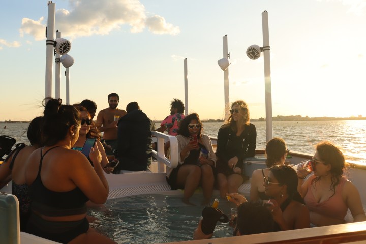 a group of people that are standing in the water