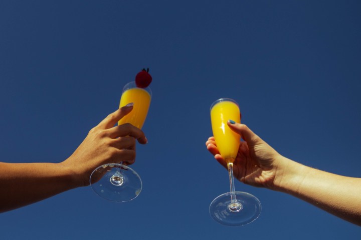 a hand holding a toy