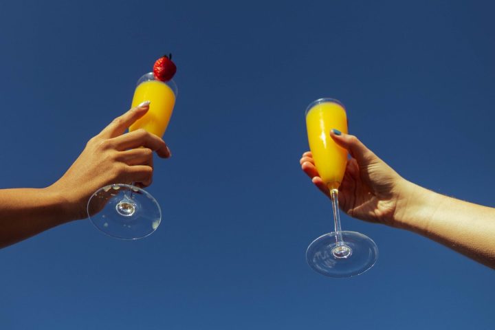 a hand holding a toy