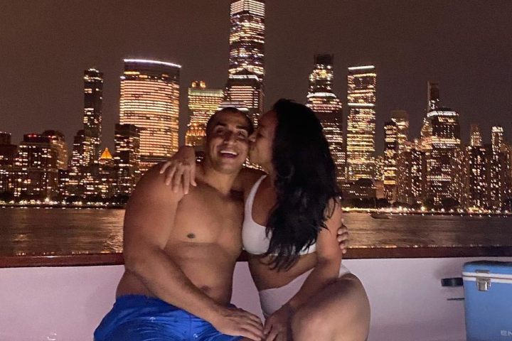 a statue of a man in a pool of water