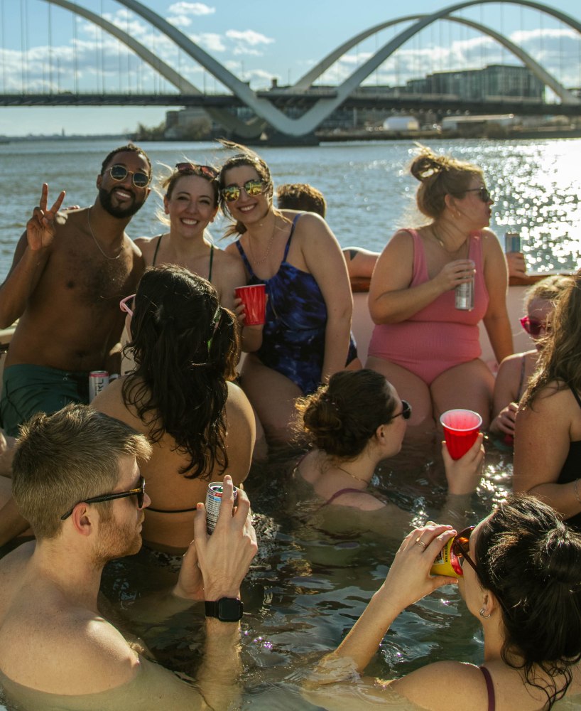 group of people in DC hot tub boat enjoying the sights