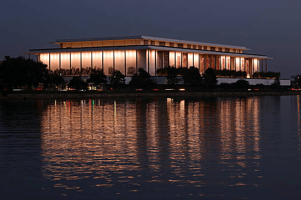 kennedy center from the water at night